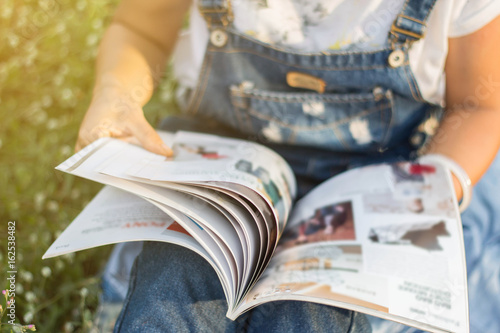 reading a magazine blur