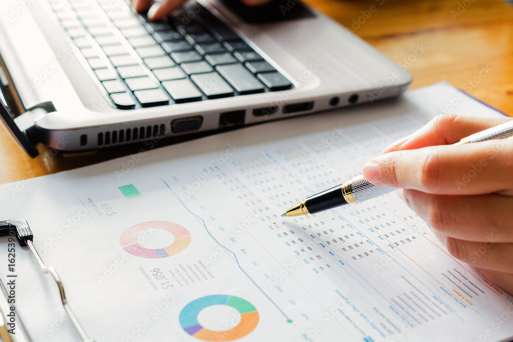 Administrator business man financial inspector and secretary making report, calculating or checking balance. Administrator business man financial inspector and secretary making report, calculating or checking balance.