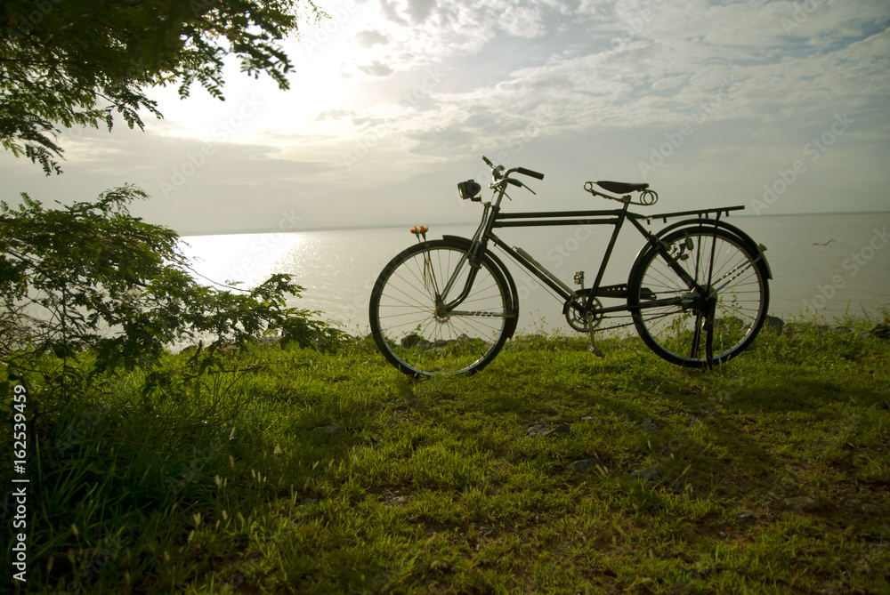Fototapeta premium Old bike in Thailand, old bike in dam