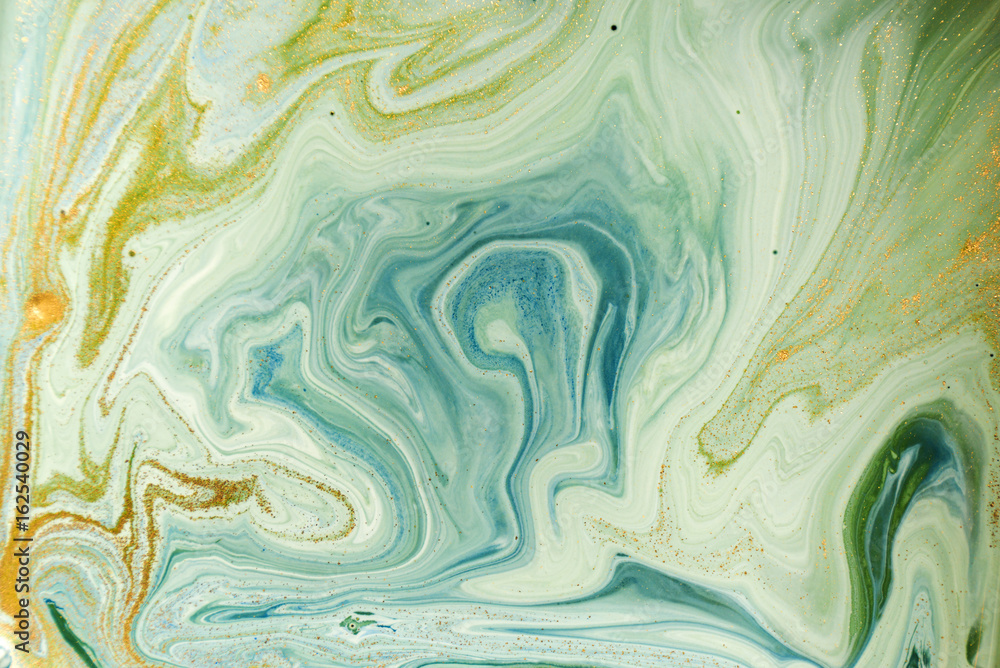 Marbled green abstract background. Liquid marble pattern