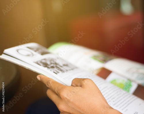 reading a magazine blur