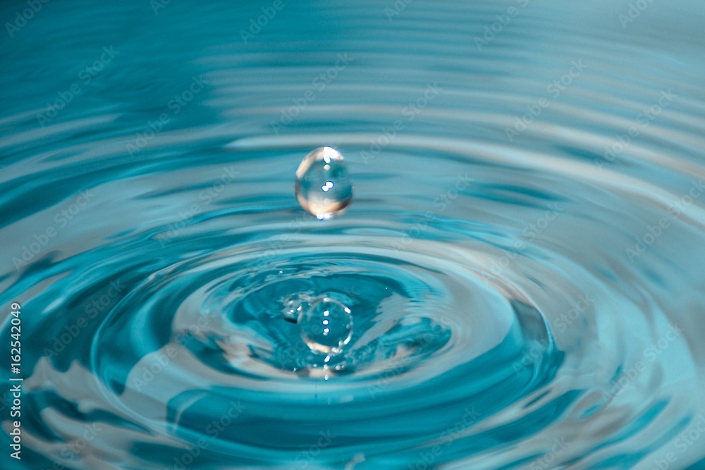 Water drop close up,Water drop,Abstract blurry background. Water drop close up,Water drop,Abstract blurry background.