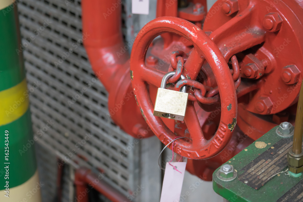 padlock and chain to lock valve.