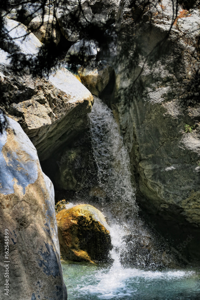 Obraz premium waterfall and landscape of Samaria Gorge at Crete (Greece).