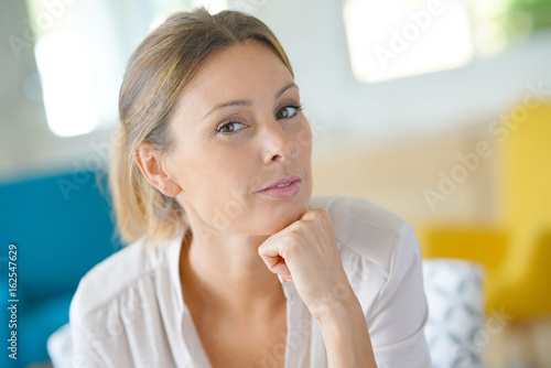 Portrait of beautiful woman relaxing at home