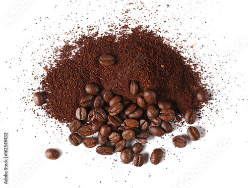 Pile of powdered, instant coffee and beans isolated on white background, top view