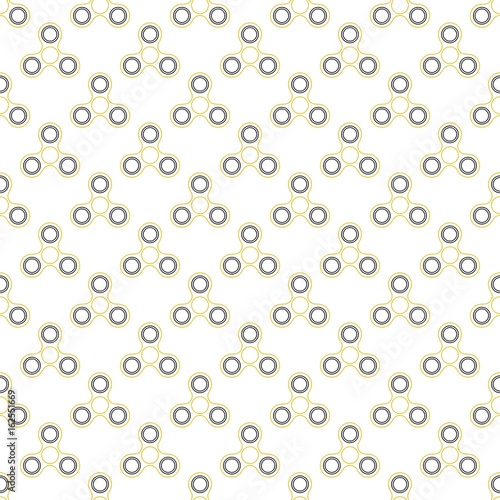 Background from yellow contours children fidget spinners on white background. Playing backdrop of hand twisting toys with bearings in a row next to each other and alternately under him 