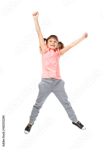 Cute jumping girl on white background