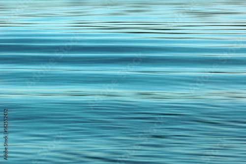 Waving blue water surface