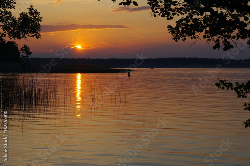 Sunset over Necko lake, Poland. © Jarek