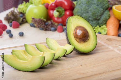 Avocado on wood table ,Healthy food concept
