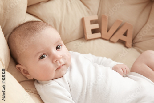 Cute baby with word EVA lyi...