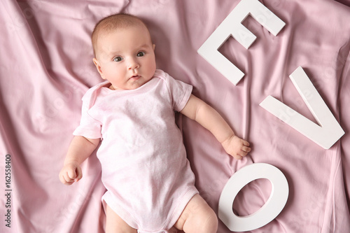 Cute baby with different le...
