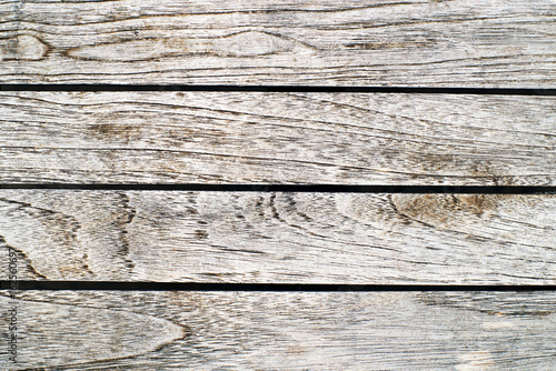 Old gray removed wooden surface, textural wooden grunge a background