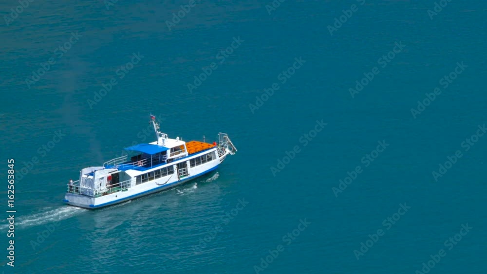 Motorboat is moving rapidly along the shore. Beautiful sea nature. Motorboat is moving rapidly along the shore. Beautiful sea nature.