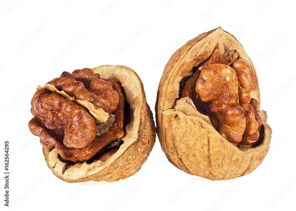 Broken walnuts isolated on white background