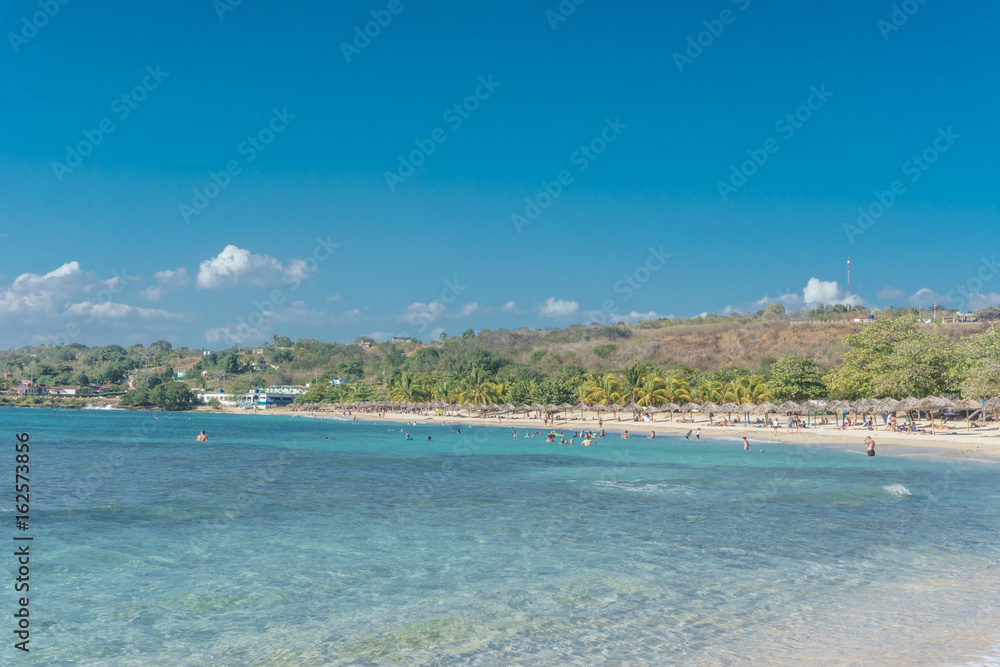 Cuba - Caribbean beach Playa Rancho Luna in Cienfuegos. Sandy coast