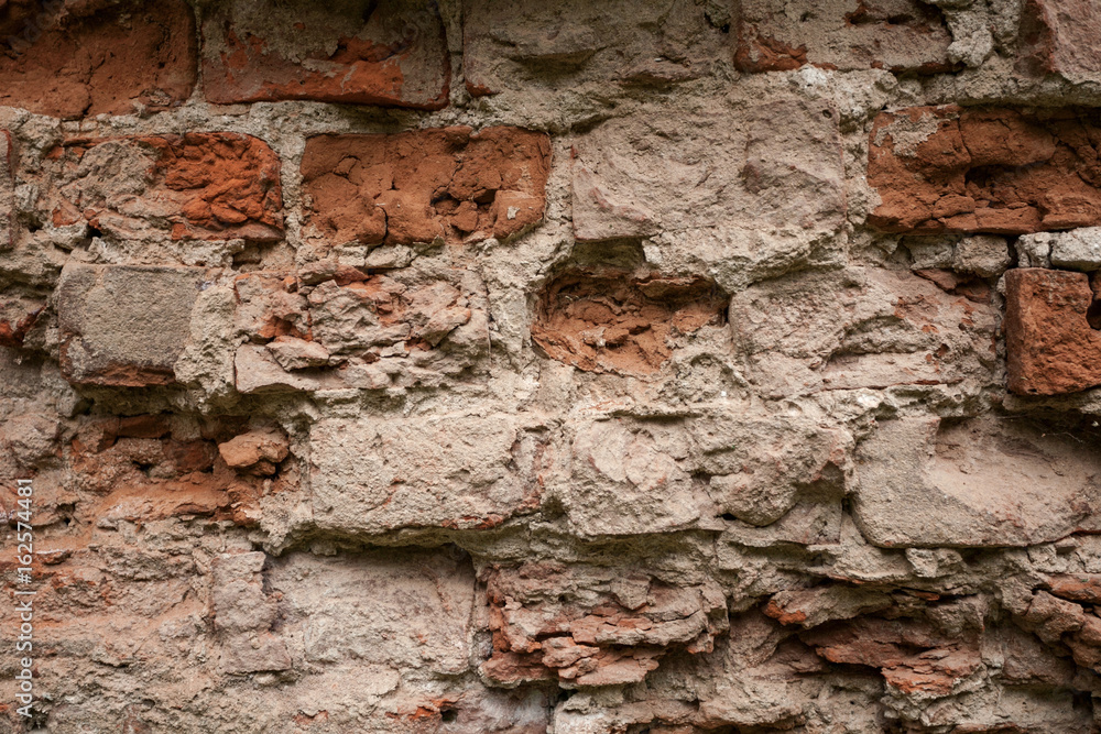Red brick wall background texture close up