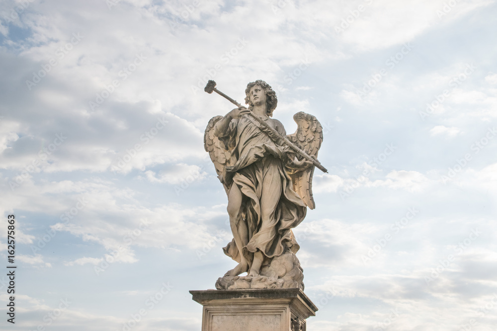 Bernini's marble statue of angel from the Sant'Angelo Bridge in Rome, Italy Bernini's marble statue of angel from the Sant'Angelo Bridge in Rome, Italy