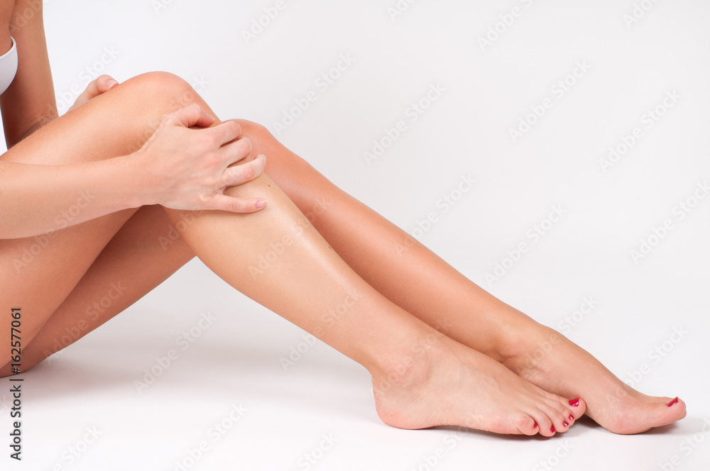 Hair removal and epilation. Woman legs with smooth skin after depilation. Hair removal and epilation. Woman legs with smooth skin after depilation.
