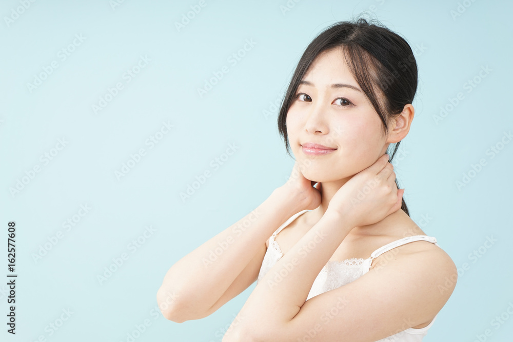 Young woman taking a body care Young woman taking a body care