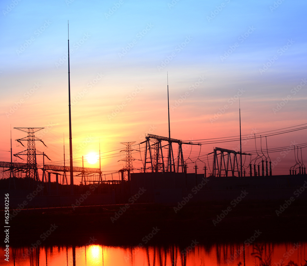High voltage substation in the setting sun