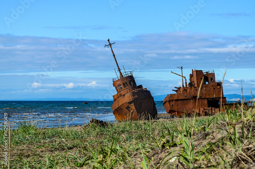 An old broken rusty ship