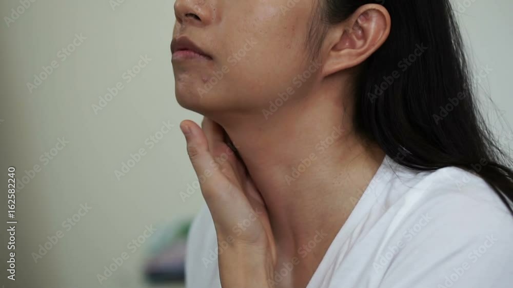 Asian woman apply foundation on her face before doing cosmetic make up in slow motion Asian woman apply foundation on her face before doing cosmetic make up in slow motion