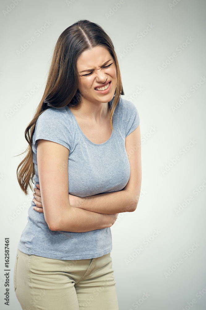 Woman with stomach pain touching tummy. Woman with stomach pain touching tummy.