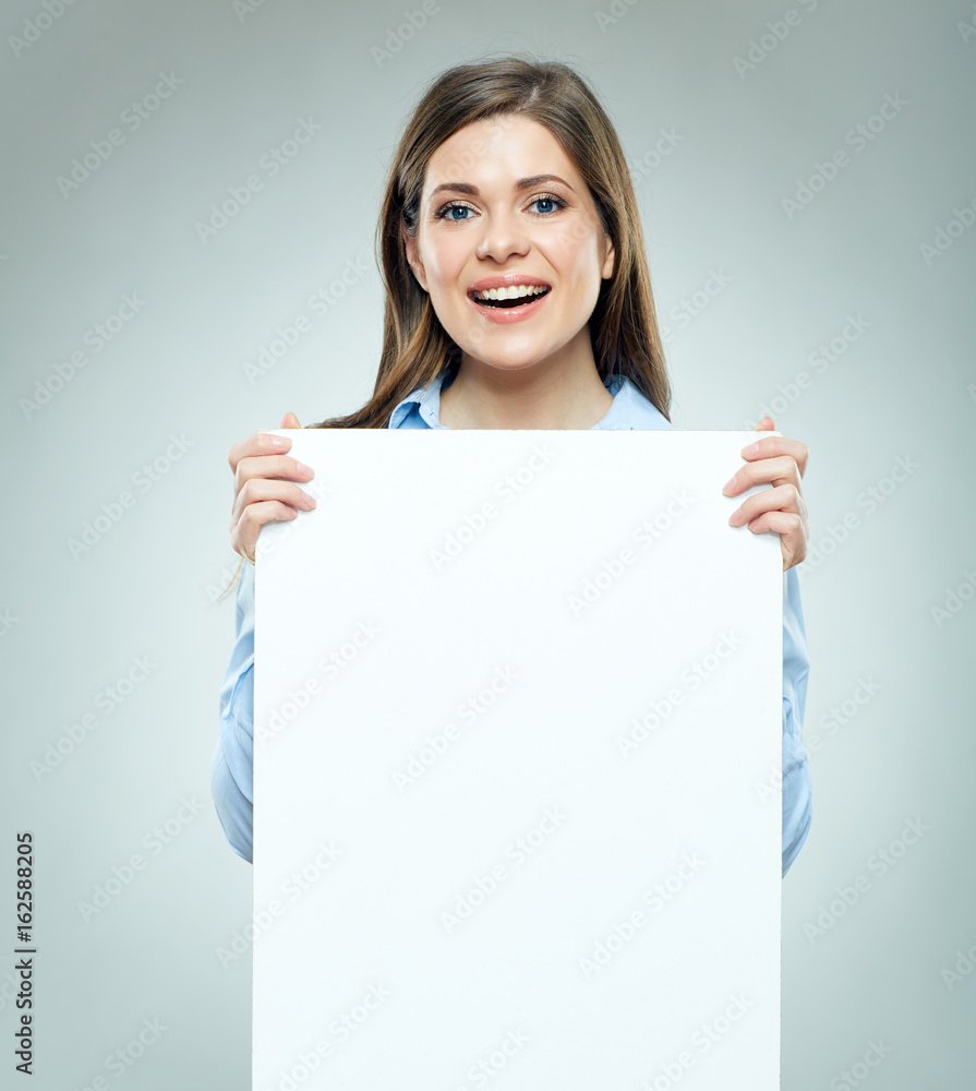Smiling business woman holding big white banner. Smiling business woman holding big white banner.