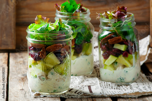 chicken, apple and pecan salad in a jar.style rustic.
