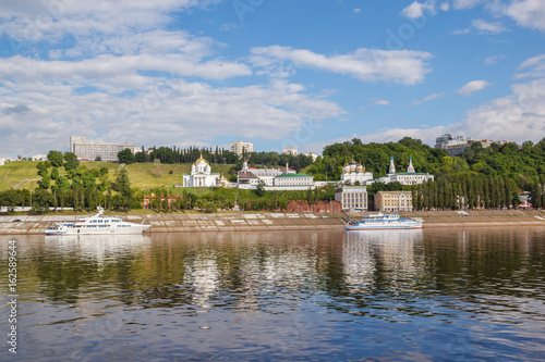 View of the Annunciation Monastery, yacht and omic near the pier in Nizhny Novgorod © Тищенко Дмитрий