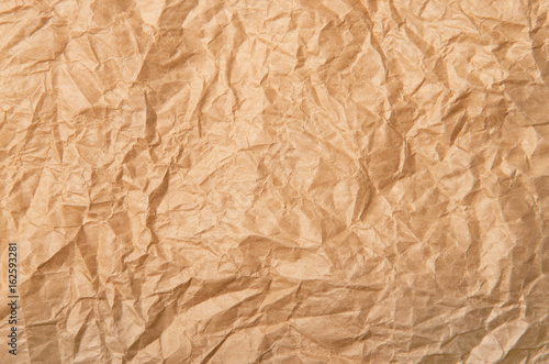 Crumpled paper background vignette