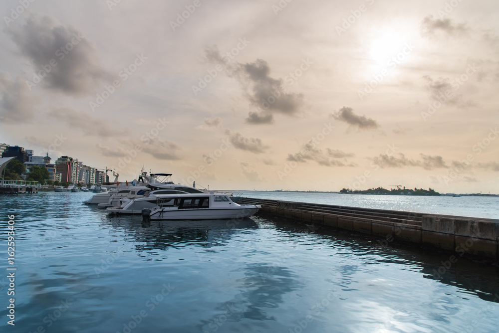 Speed boats in the harbor in city Male, capital of Maldives