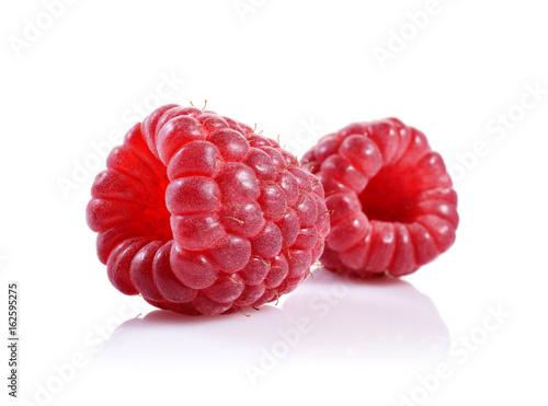 Healthy food. Close up view fresh ripe raspberry isolated