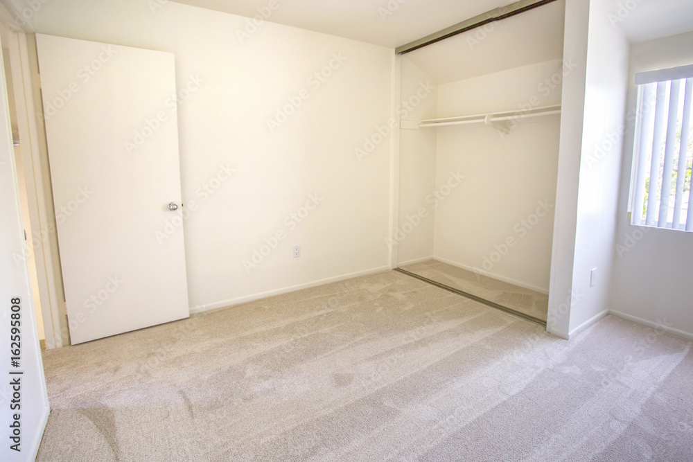 Empty bedroom in a model home in southern California Empty bedroom in a model home in southern California