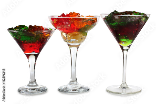 Fruit cocktail in a glass goblet on a white background