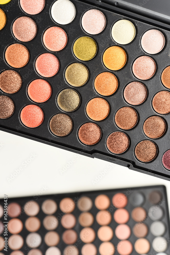 collection of make up and cosmetic beauty products arranged collection of make up and cosmetic beauty products arranged