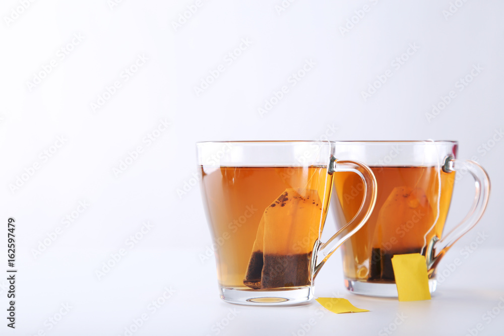 Cup of tea with teabag on a white background Cup of tea with teabag on a white background