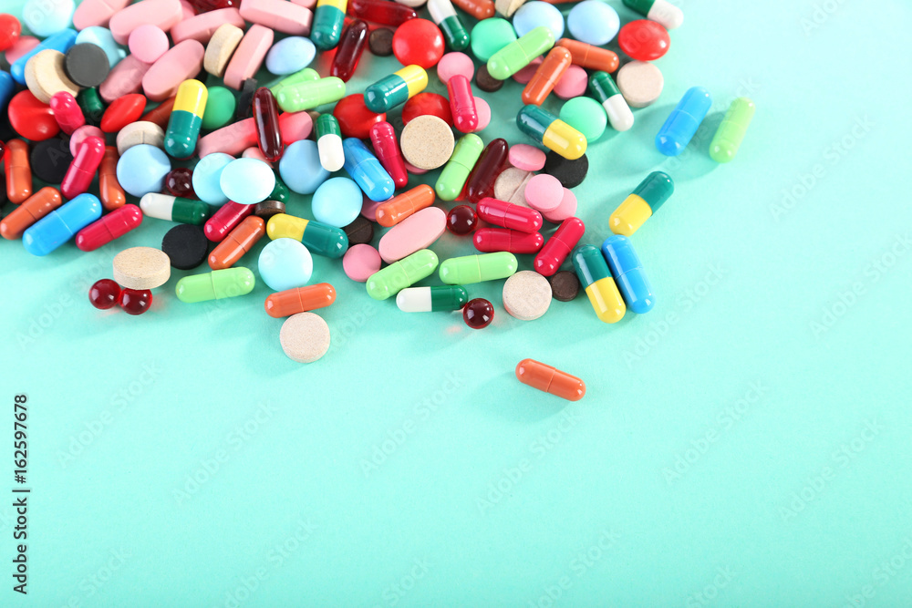© 5second - Different colorful pills on mint background © 5second - Different colorful pills on mint background