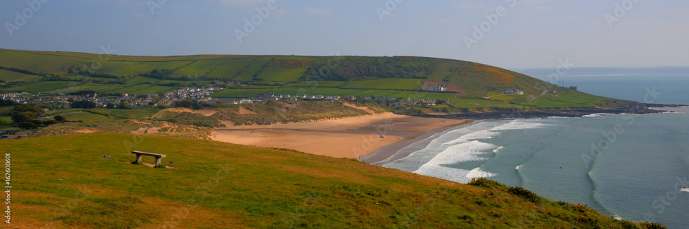 Obraz premium Croyde Devon UK beach in summer with blue sky panoramic view