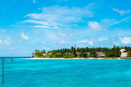 beach villas on a tropical island © meanmachine77