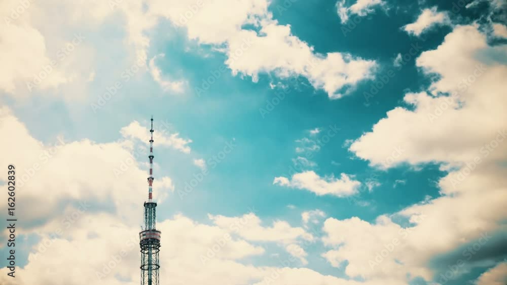 TV tower against the background of Running clouds. Time Lapse. TV tower against the background of Running clouds. Time Lapse.