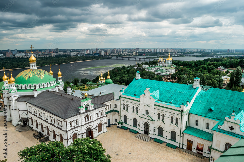 view of yard in Kyiv Pechersk Lavra and Kyiv cityscape from bell tower view of yard in Kyiv Pechersk Lavra and Kyiv cityscape from bell tower