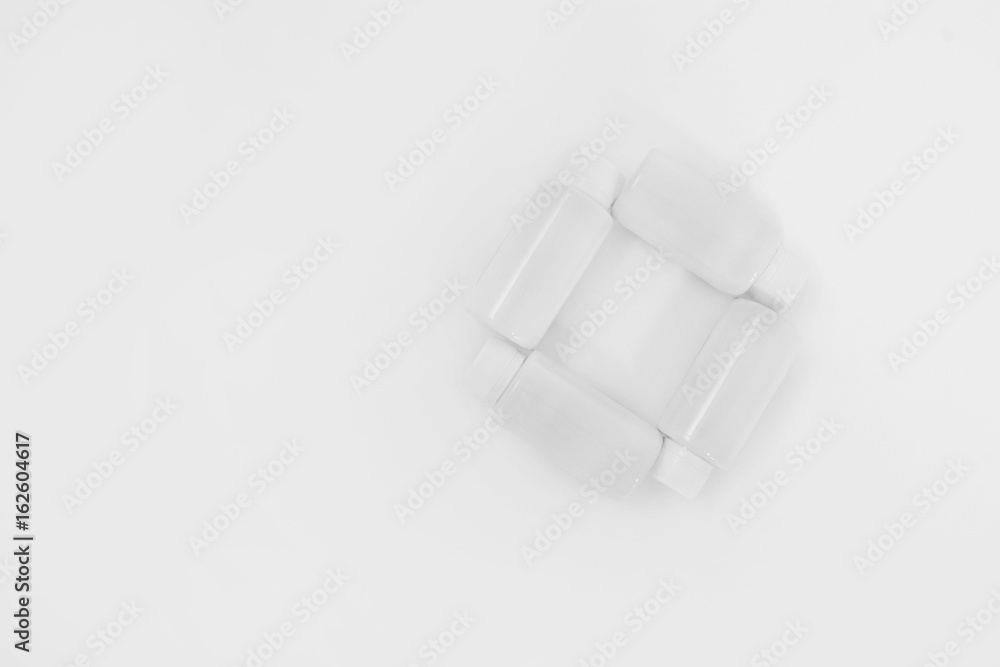 White bottles on a white background White bottles on a white background