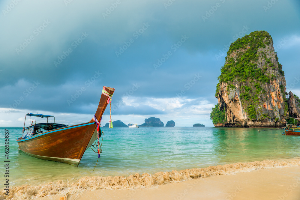 Beautiful wooden boat long tail off the coast of Thailand close-up Beautiful wooden boat long tail off the coast of Thailand close-up