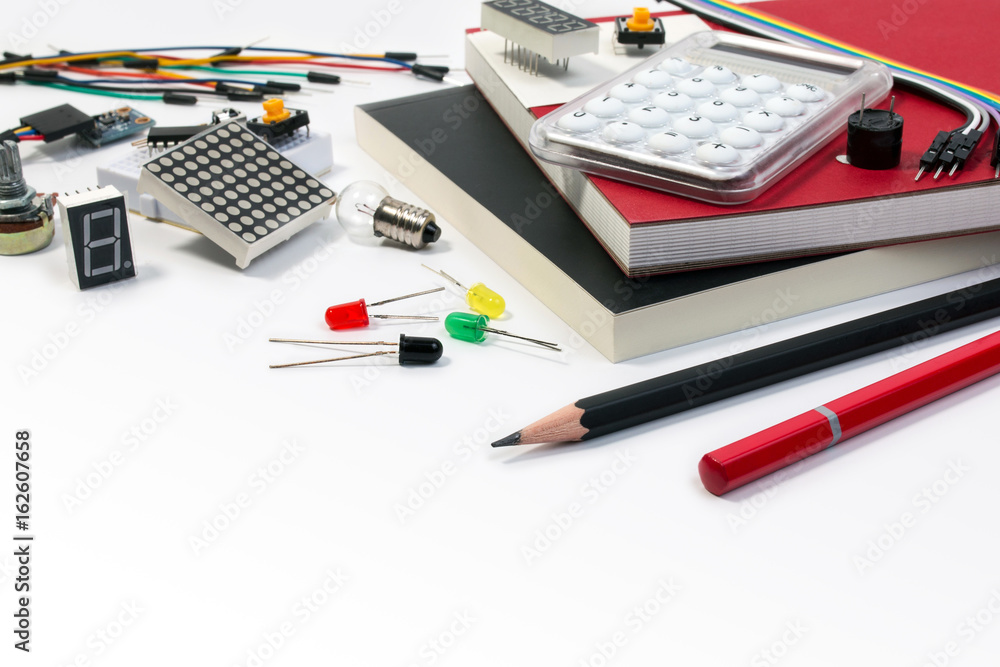 DIY electronic maker tools components on white background. DIY electronic maker tools with copy space for text on black background. DIY electronic handmade tools robot and electronic components. DIY electronic maker tools components on white background. DIY electronic maker tools with copy space for text on black background. DIY electronic handmade tools robot and electronic components.