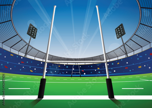 Rugby field with bright stadium.