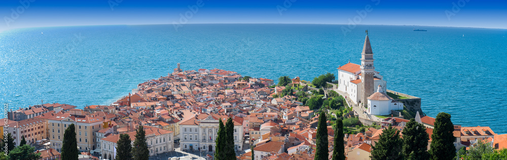 Panoramic view of Piran with St. George´s Parish Church in Slovenia. The church was bult in the venetian renaissance architectural style.