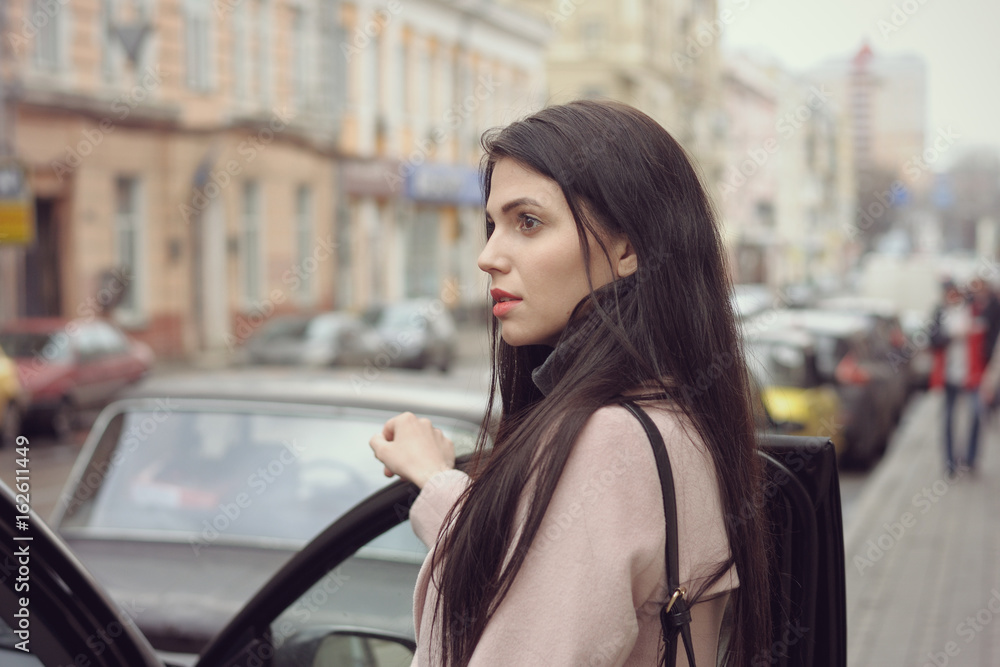 Girl gets into the car Girl gets into the car